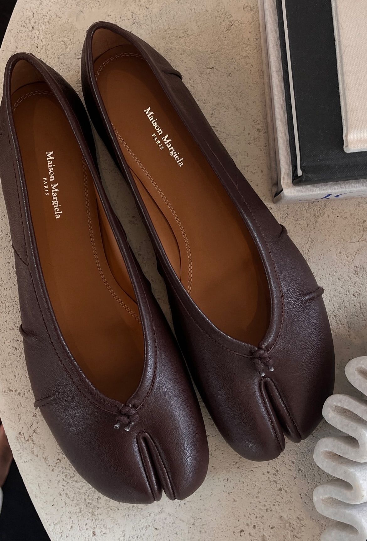 Maison Margiela Tabi shoes photographed as an archive object